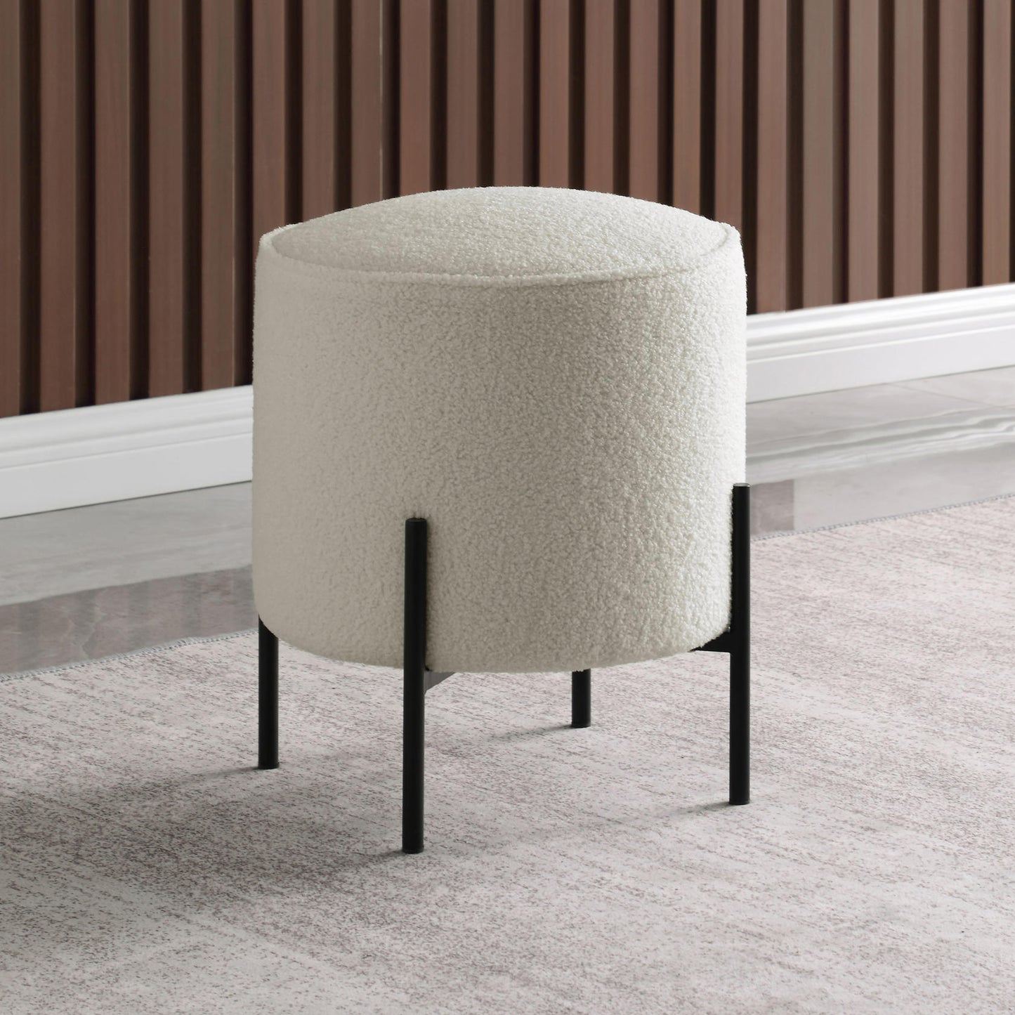 Basye Round Upholstered Ottoman Beige And Matte Black